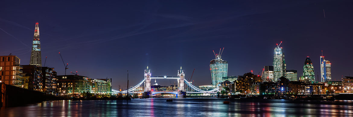 City of London skyline featuring Tower Bridge, the Shard, 20 Fenchurch Street, and Heron Tower